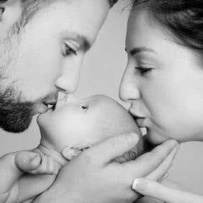 Newborn baby photographer close up family portrait