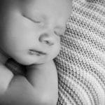 Newborn portrait sleeping baby black and white warrington