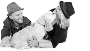 black and white of a couple with their dog taken at Bartley Studios Photography Liverpool Portrait Photographer