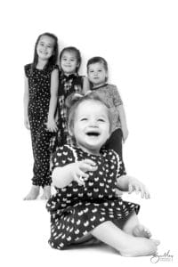 photo studio family portrait of 4 kids
