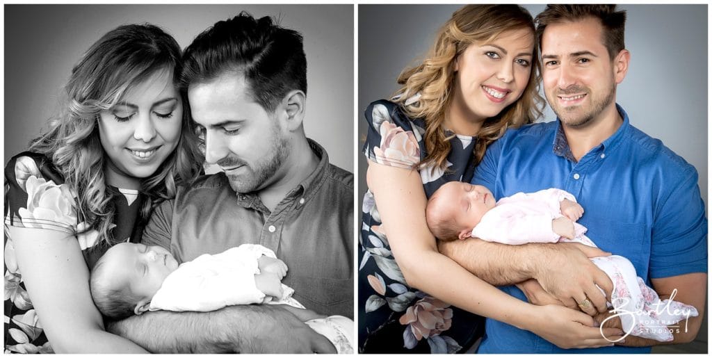 couple holding newborn baby in photo studio warrington