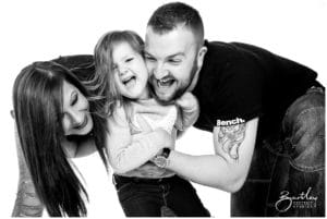 fun family photograph taken at bartley studios in warrington