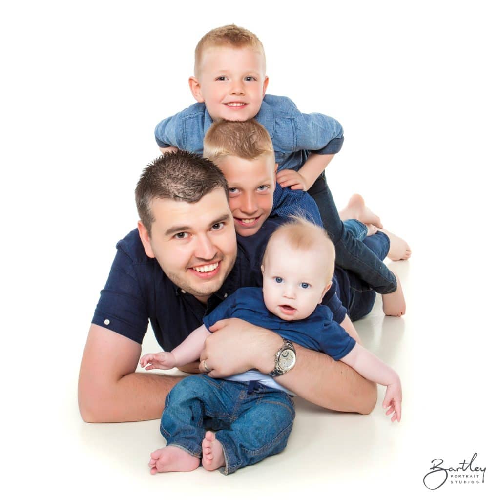 Family Portrait pile on dad