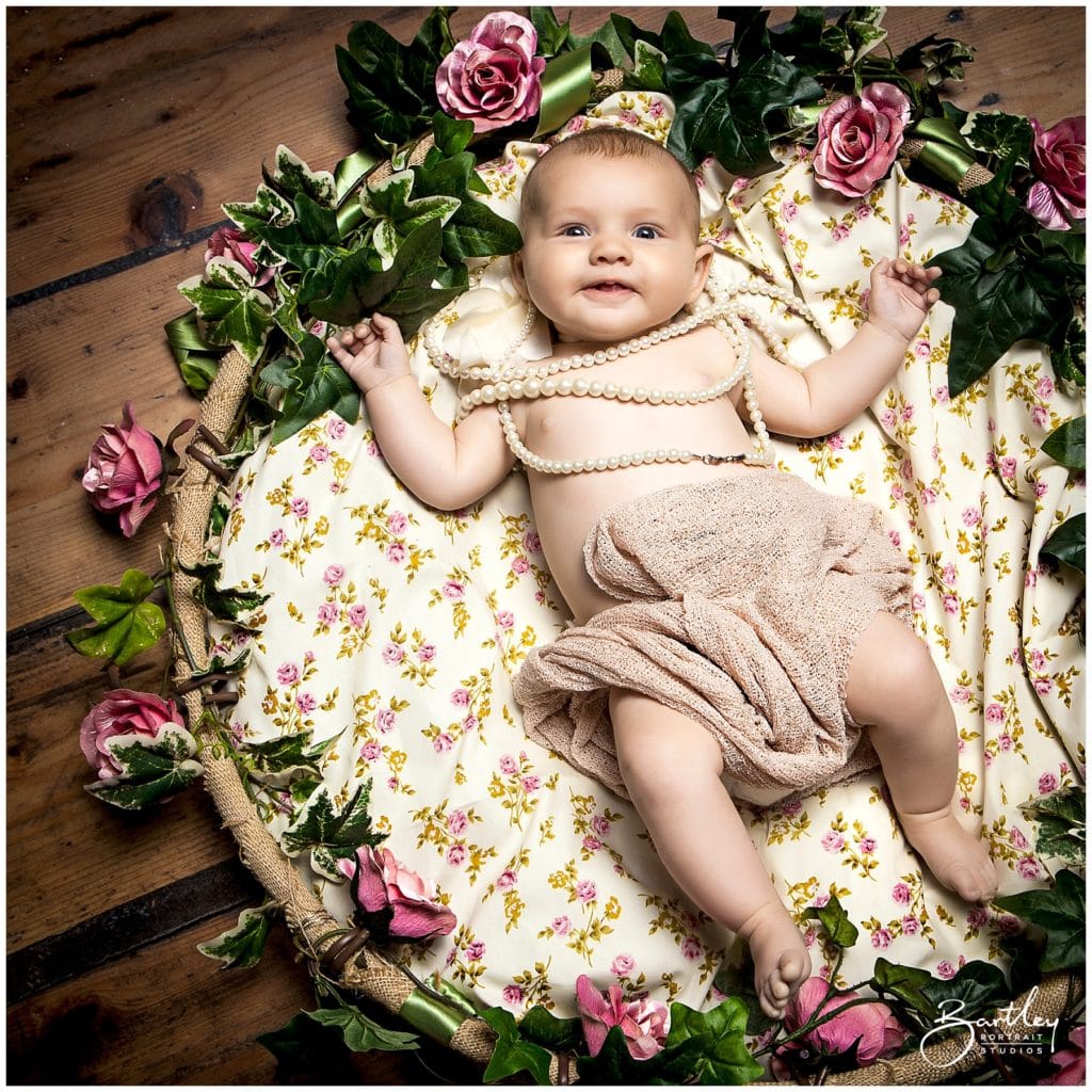 newborn portrait at warrington portrait studio with roses