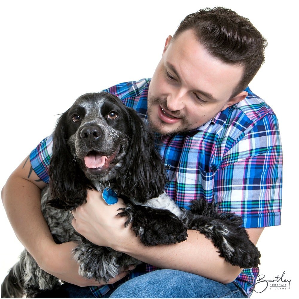 Cocker Spaniel with couple portrait