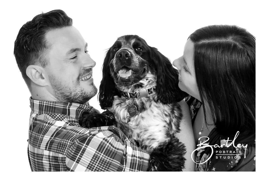 Cocker Spaniel with couple portrait