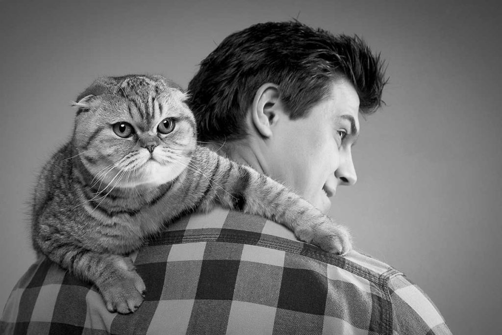 man and cat grumpy black and white photo shoot professional