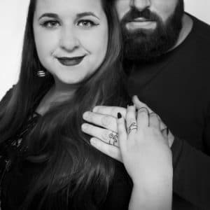 couple love black and white photo shoot ring holding hands